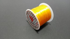 画像1: オペロンゴム ライトオレンジ 水晶の線 ブレスレット作成用 太さ約0.8mm 長さ約70m ポリウレタン シリコンゴム